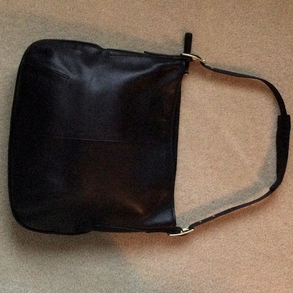 Large black leather shoulder strap Coach bag.